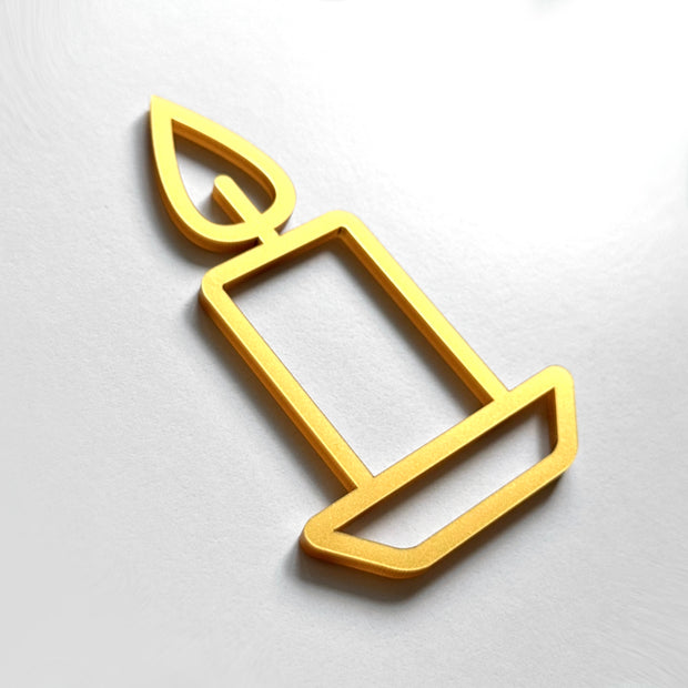 A simple golden candle icon is shown against a white background.