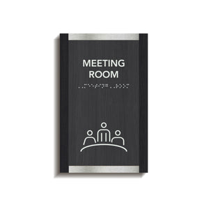 a black and white sign that says meeting room