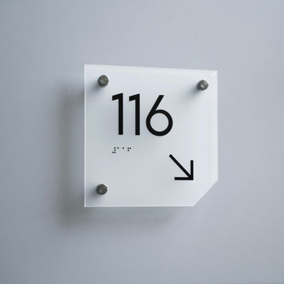 a square white clock with black numbers on it