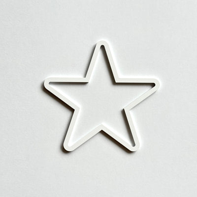 A white star shape is centered against a plain white background.