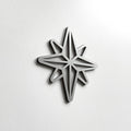 A silver star-shaped object is mounted on a white wall. - Photo #2