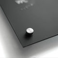 a close up of a button on a black surface - Photo #9