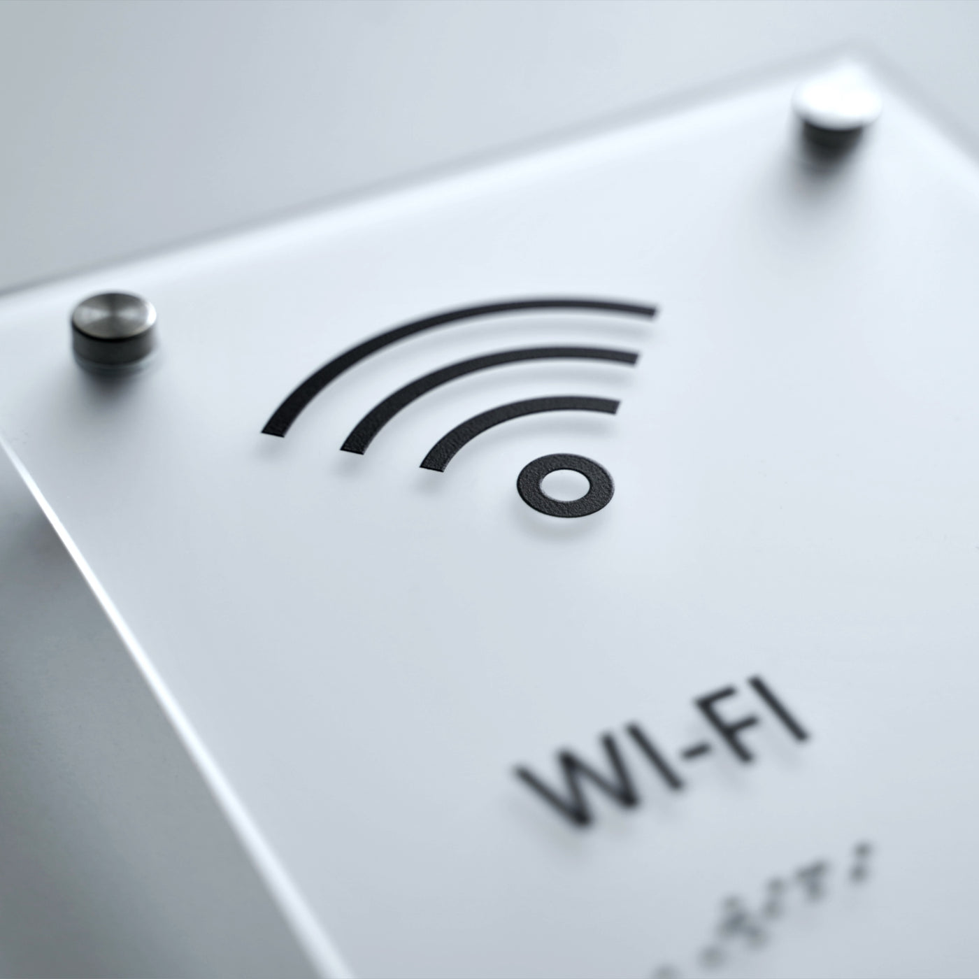 a close up of a wifi sign on a white surface