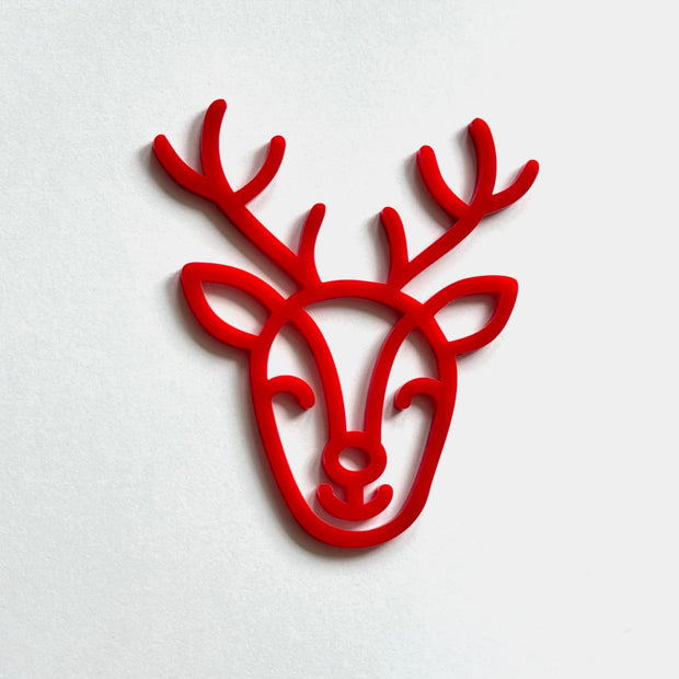 A red stylized deer head with antlers is displayed against a white background.