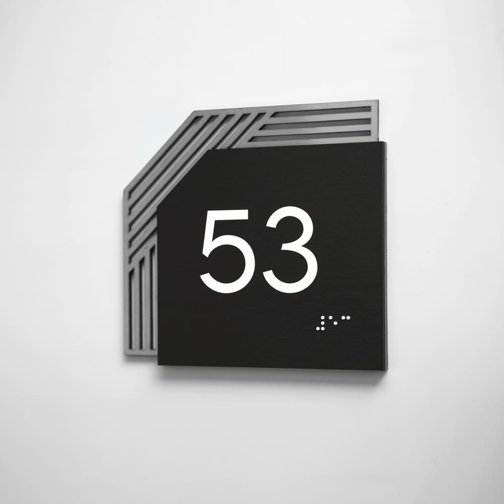 a black and white sign with the number 53 on it