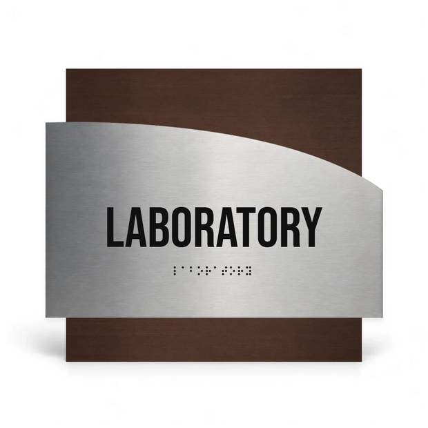 a sign that reads "LABORATORY" in large black letters, with a small "I" symbol below the text, indicating the use of Braille or a similar format for the visually impaired.