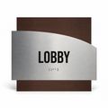 a sign with the word "LOBBY" prominently displayed in the center. - Photo #1
