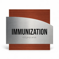 a sign with the word "IMMUNIZATION" written on it, indicating that it is related to vaccinations or vaccinations. - Photo #1