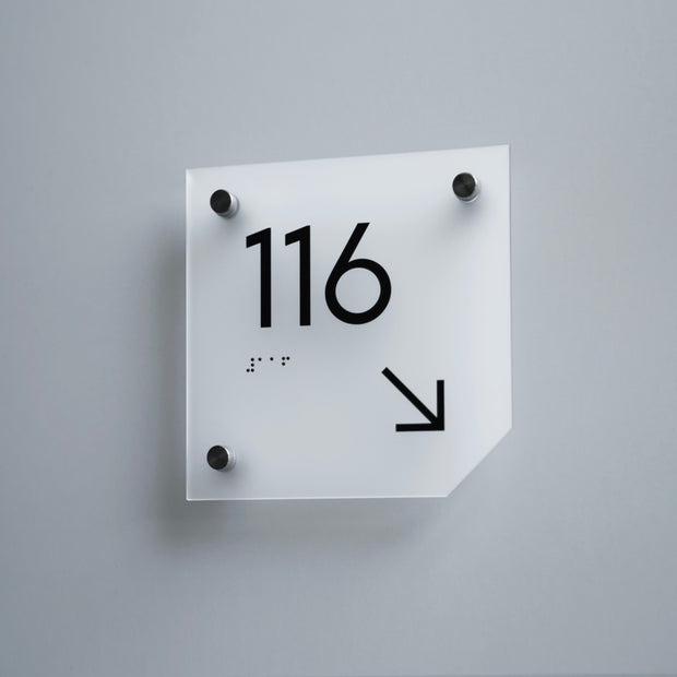 a white square clock with black numbers on it
