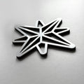A metallic star-shaped object with a geometric design. - Photo #5