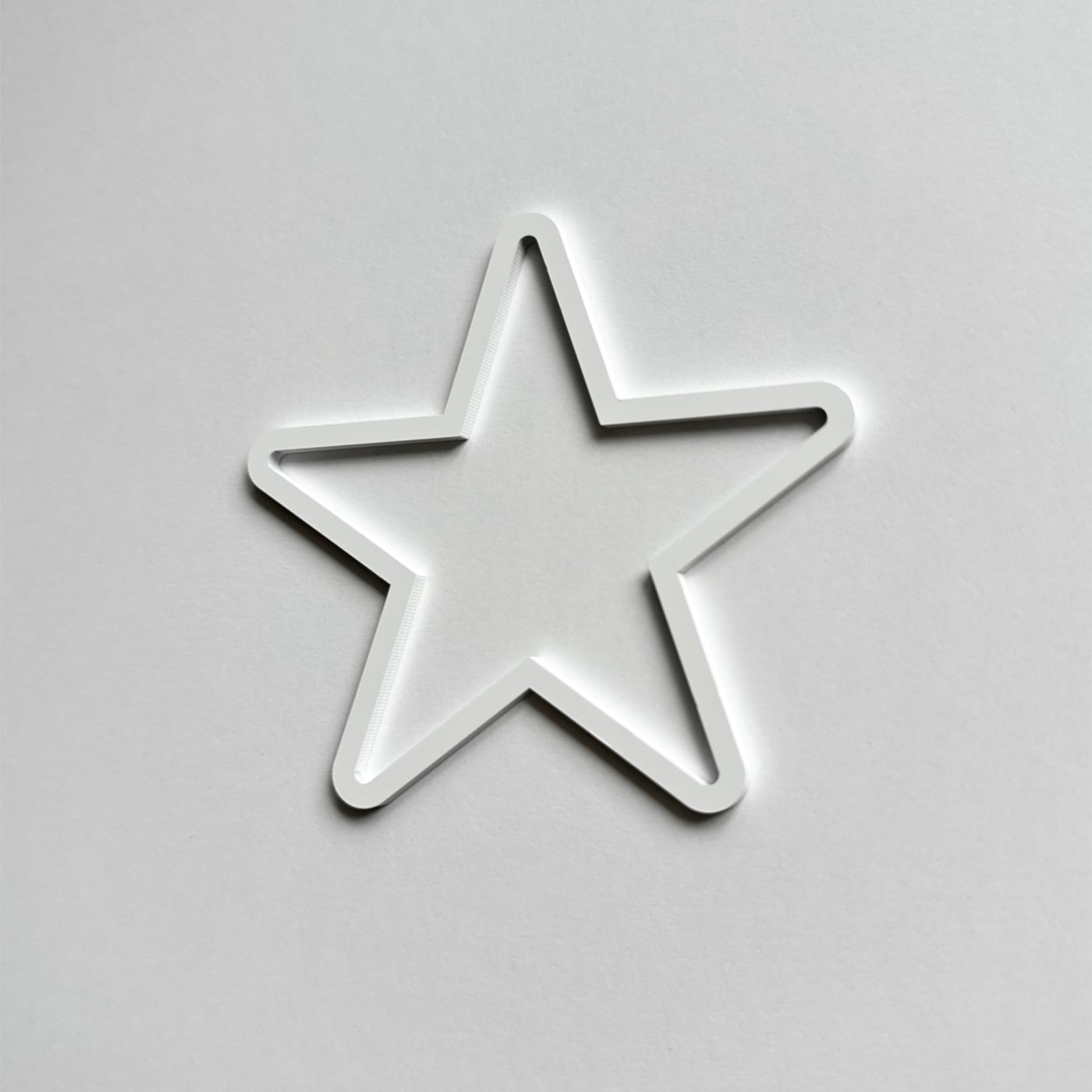 A white star-shaped object is shown against a plain white background.
