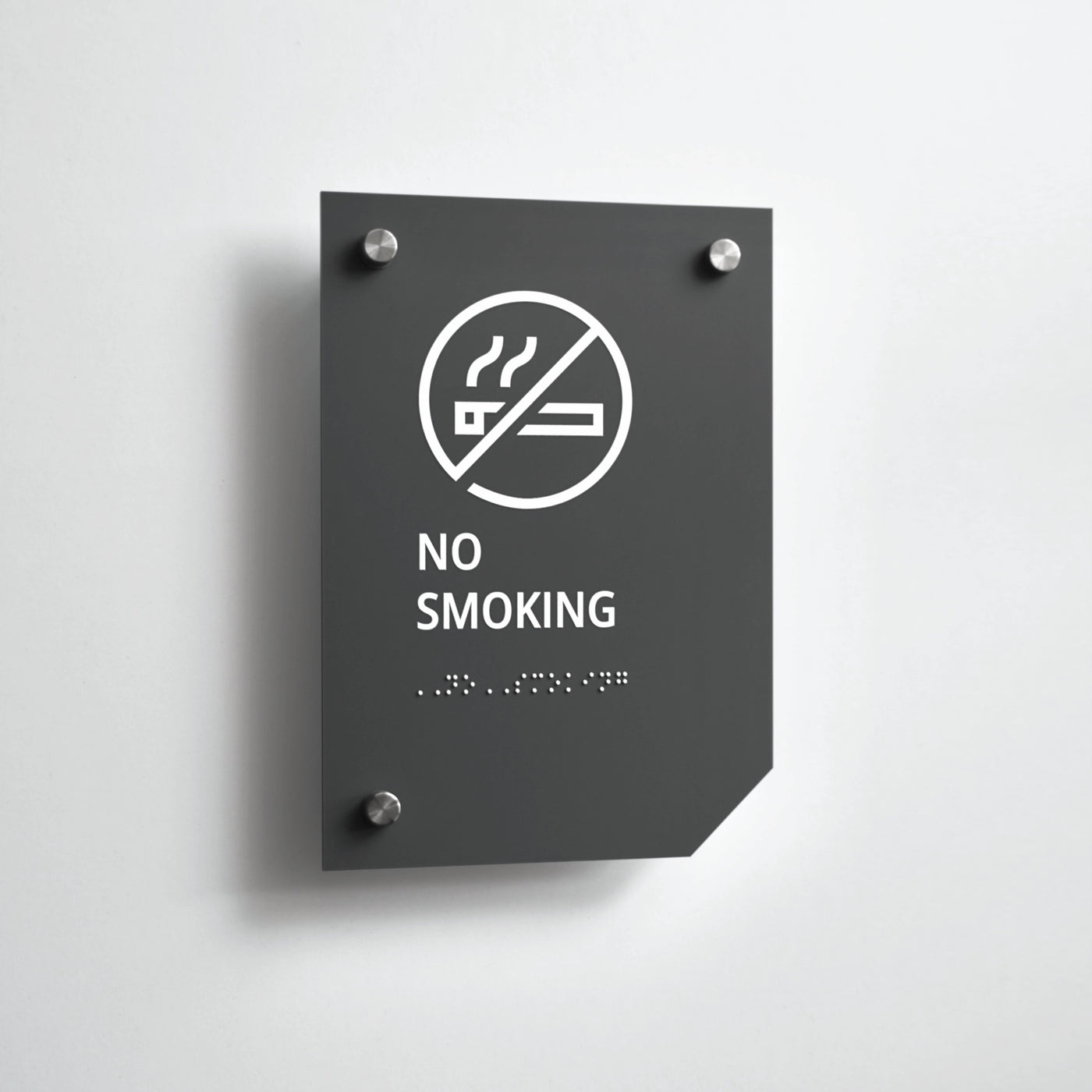 a no smoking sign on a white wall