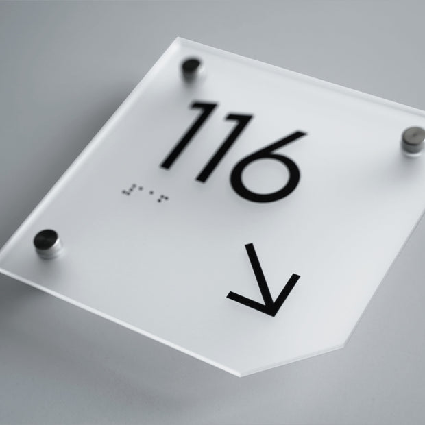 a close up of a sign on a table