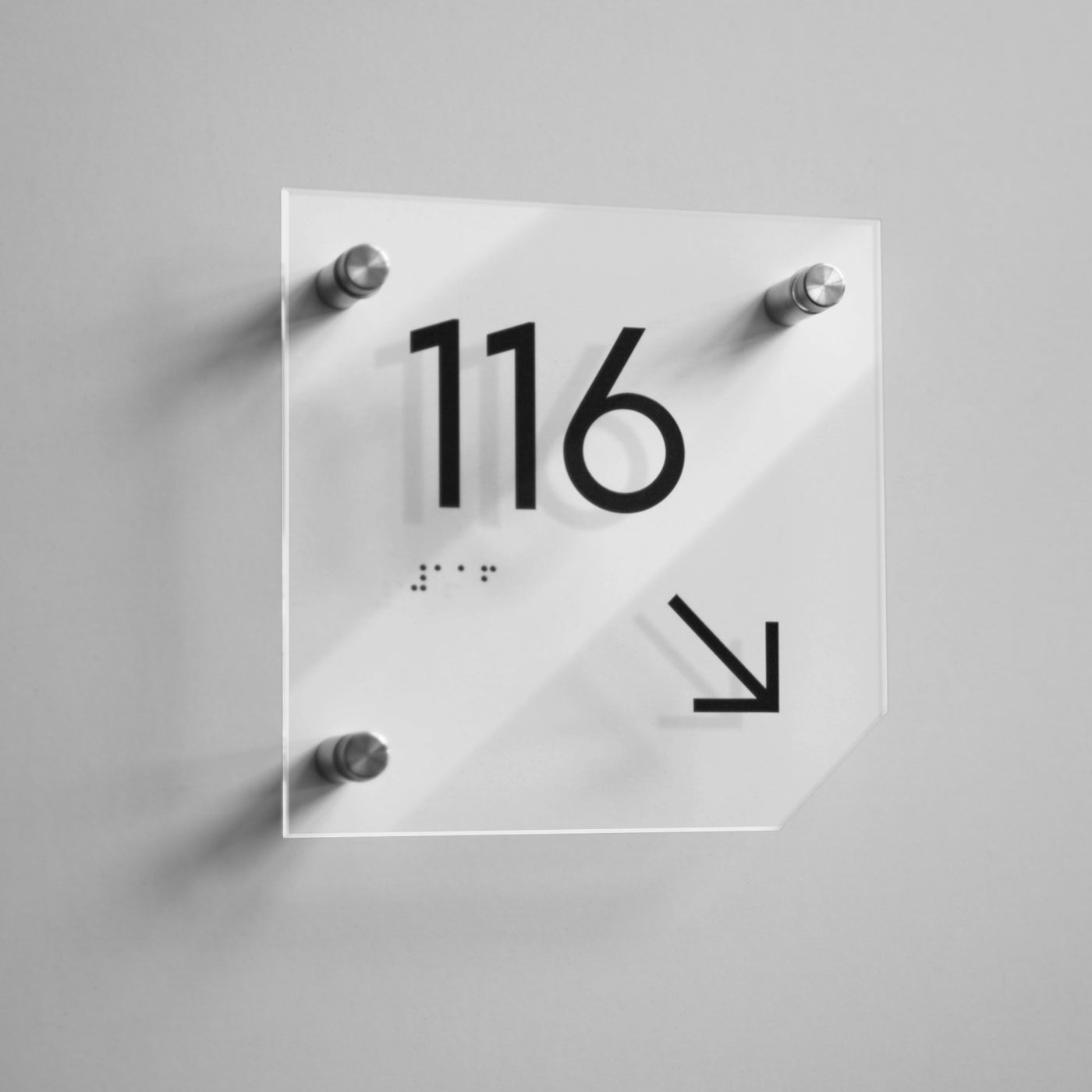 a white clock with black numbers on it