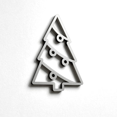 A simple, minimalist Christmas tree-shaped object made of a material that resembles a wire or metal.