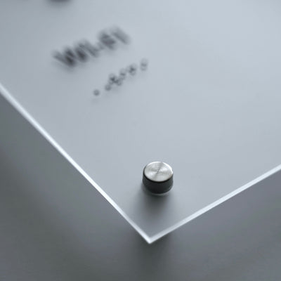 a close up of a button on a white surface