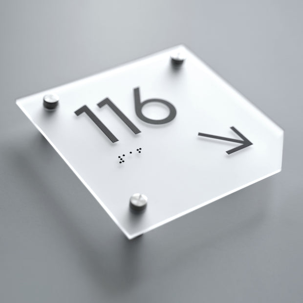 a close up of a clock on a surface