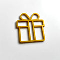 A golden gift box-shaped object is shown against a white background. - Photo #8