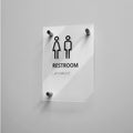 a restroom sign on a white wall - Photo #11