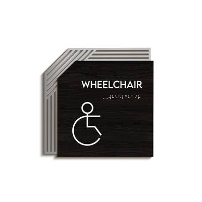 a black and white photo of a wheelchair sign
