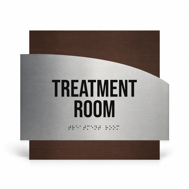 a treatment room sign with the text "TREATMENT ROOM" prominently displayed.