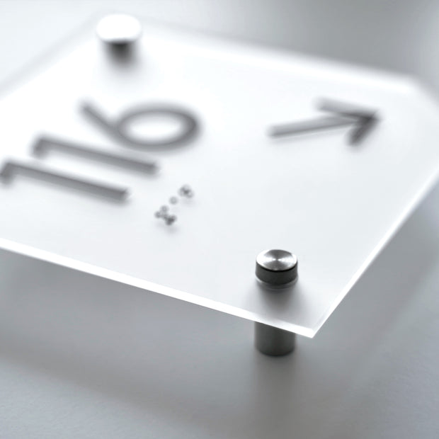 a close up of a clock on a table