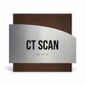 a sign with the text "CT SCAN" in bold black letters, indicating a location or facility related to a CT scan. - Photo #1