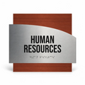 a sign with the text "HUMAN RESOURCES" and a section with Braille text below it. - Photo #1