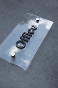 Office door sign made of clear acrylic with raised black lettering mounted using metal standoffs - Photo #6