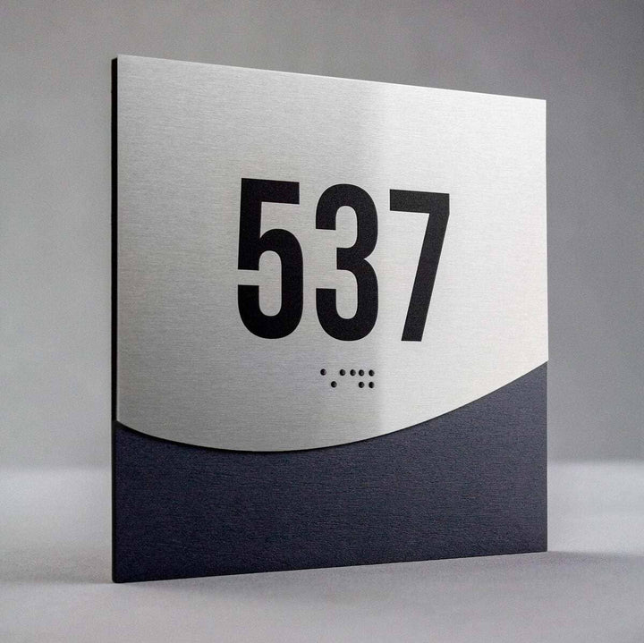 Hotel room number sign 537 with Braille, brushed stainless steel and dark wood base - "Jure" Design