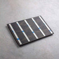 Back view of interior sign showing wooden base with adhesive mounting strips for wall installation - Photo #9
